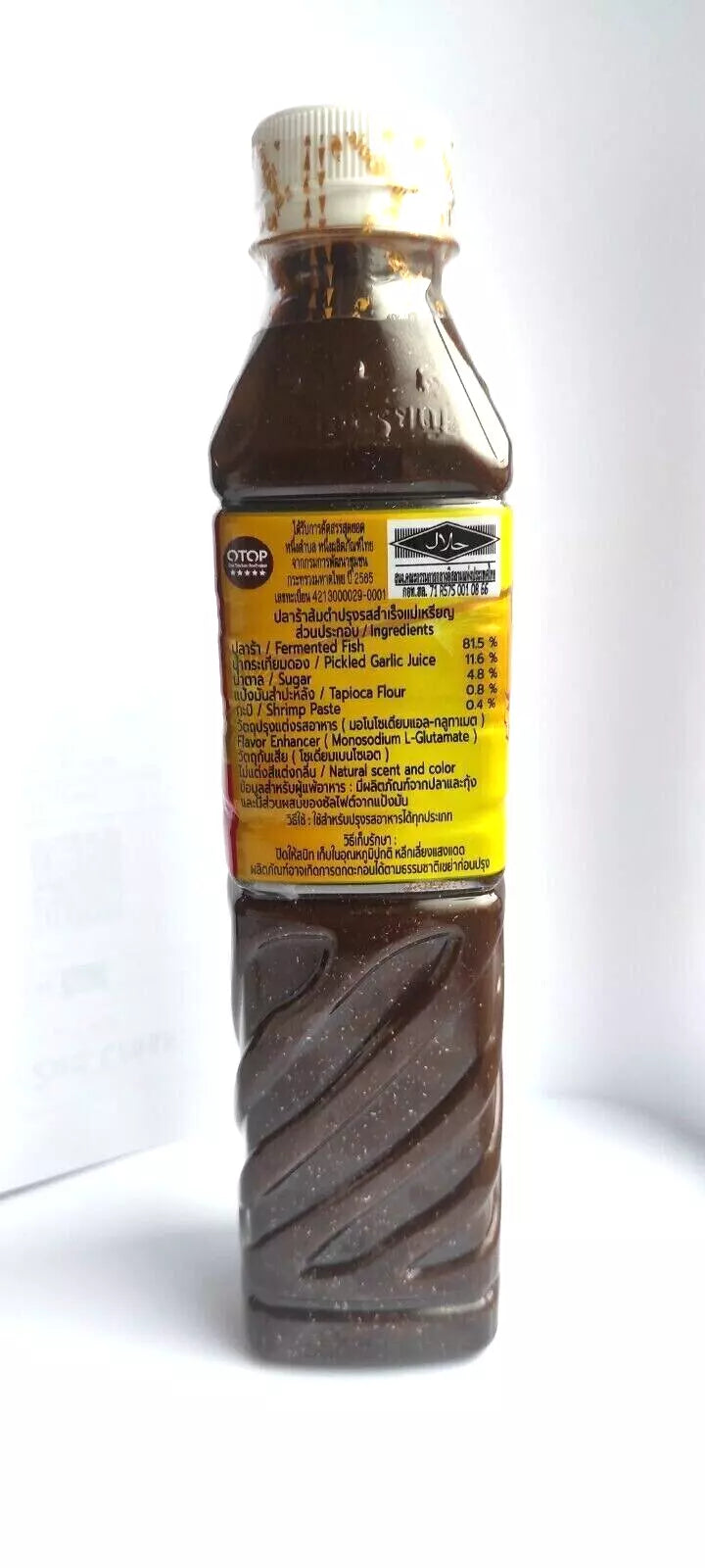 Back view of Mae Rien Fermented Fish Sauce bottle showing detailed ingredient list and product information in Thai and English.