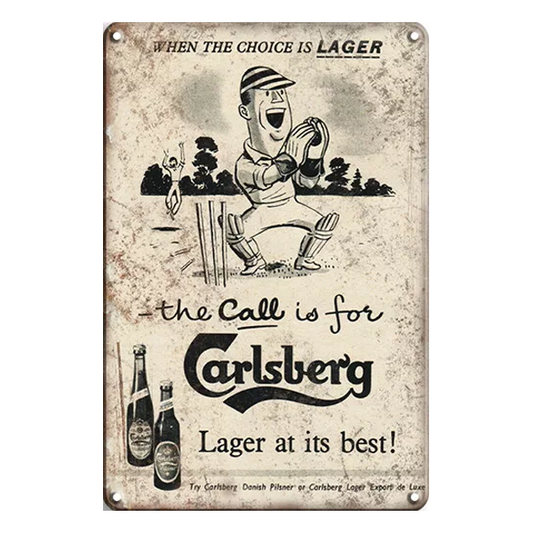 Vintage-style Carlsberg Lager metal sign with cricket-themed design and slogan “The Call is for Carlsberg – Lager at its best!”