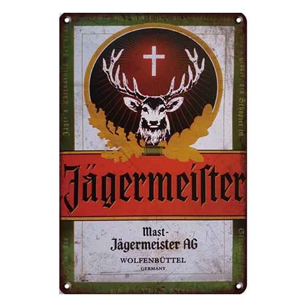 Retro Jägermeister metal sign featuring the iconic stag and cross logo, ideal for home bars, pubs, or man caves.