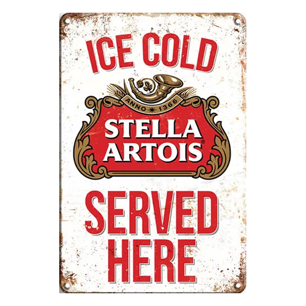 Vintage Stella Artois aluminium sign with "Ice Cold Served Here" text, red and white branding, and a distressed retro design. Ideal for home bars and pubs.