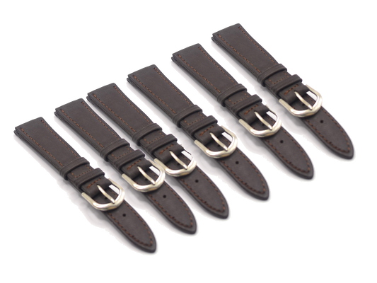 A pack of six brown genuine leather watch straps, each featuring contrast stitching and a polished silver buckle. The straps are arranged in a neat row, showcasing the high-quality craftsmanship and classic design. Suitable for watches with an 18mm lug width.